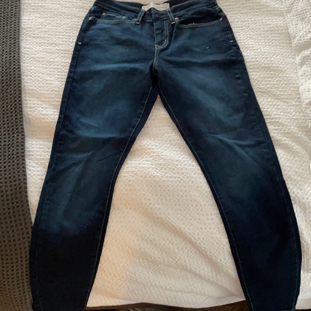 Never worn dark skinny jeans by Levi’s